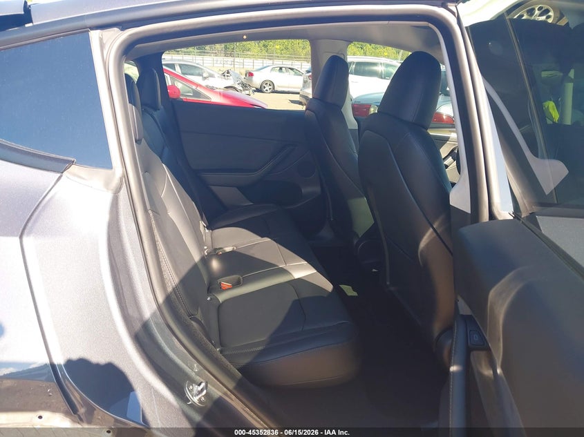 2023 Tesla Model y VIN 7SAYGDEE6PA050584 IAAI salvage auction — REAR END, Salvage Title, sold $10,000 on 2026-07-26 (photo 8)
