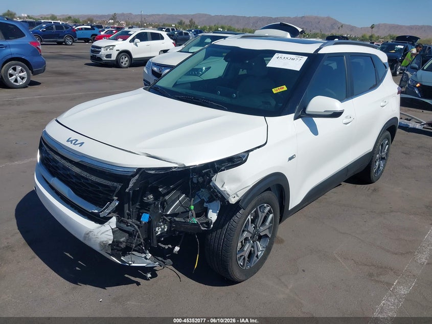 2023 Kia Seltos VIN KNDERCAA1P7391049 IAAI salvage auction — LEFT FRONT, Salvage (Arizona), sold $8,025 on 2026-07-07 (photo 2)