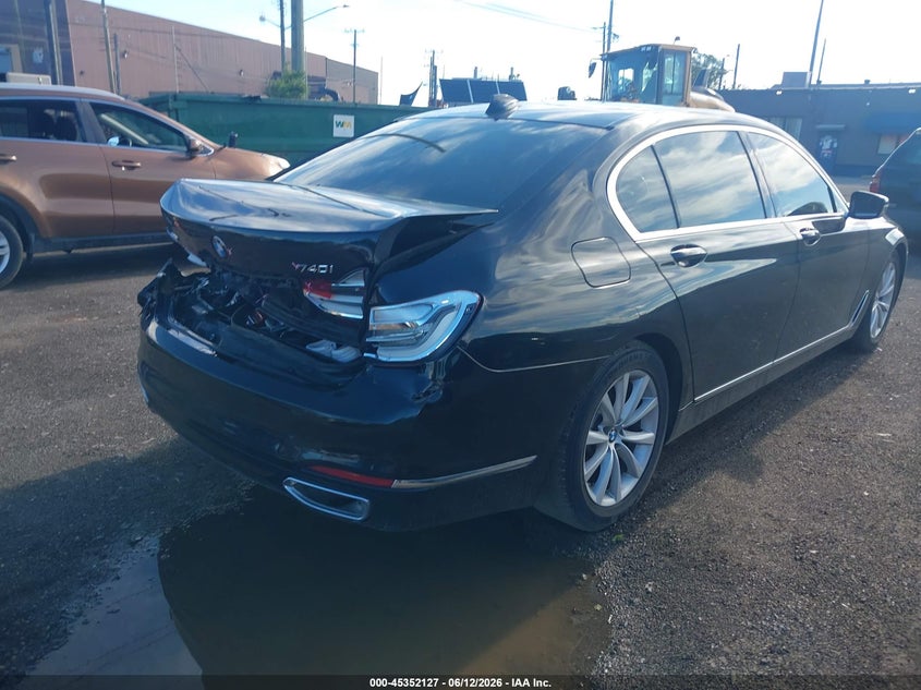 2019 BMW 7er VIN WBA7E4C51KGV28409 IAAI salvage auction — REAR END, Clear (Michigan), sold $4,625 on 2026-07-30 (photo 4)