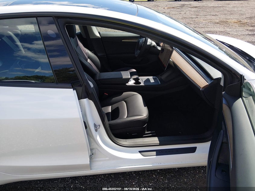 2023 Tesla Model 3 VIN 5YJ3E1EA6PF495323 IAAI salvage auction — REAR END, Salvage Title, sold $8,300 on 2026-08-02 (photo 5)