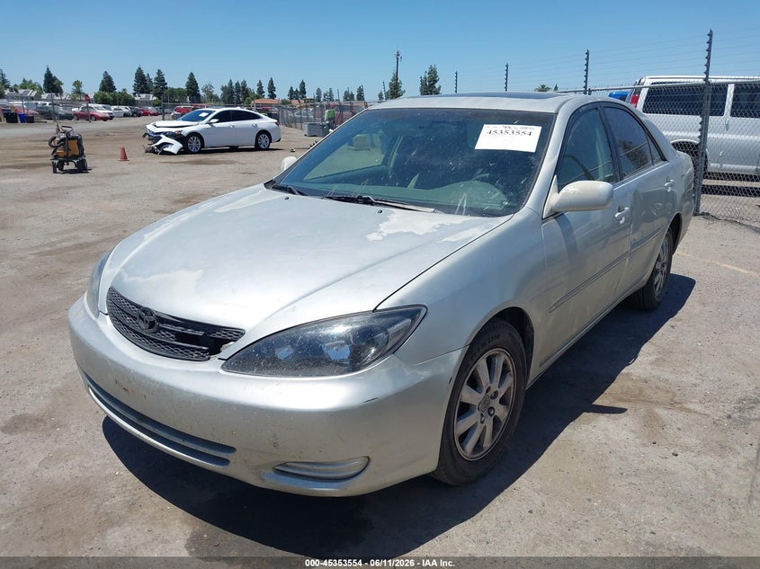 2002 Toyota Camry VIN JTDBE32K520106960 IAAI salvage auction — LEFT SIDE, Salvage (California), sold $475 on 2026-07-28 (photo 2)
