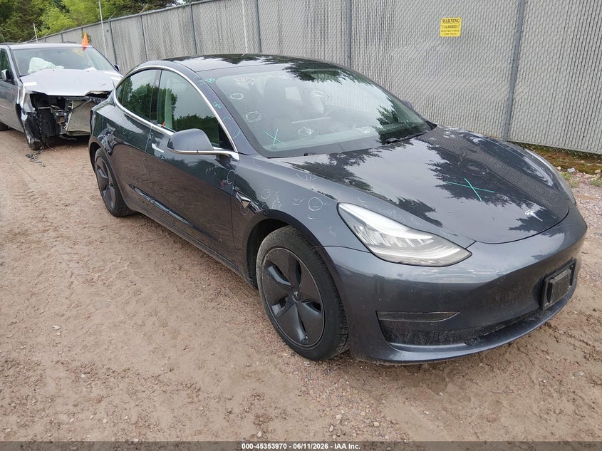 2019 Tesla Model 3 VIN 5YJ3E1EB8KF477357 IAAI salvage auction — HAIL, Clear (Wisconsin), sold $5,100 on 2026-07-16 (photo 1)