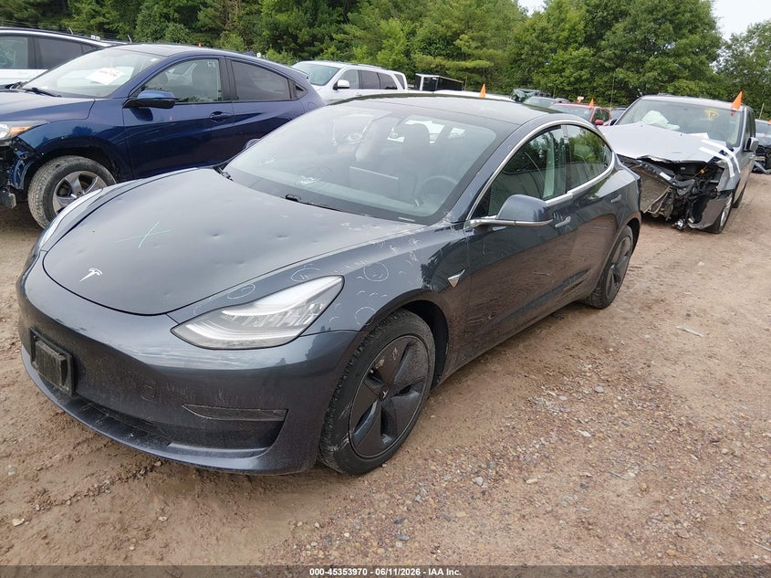 2019 Tesla Model 3 VIN 5YJ3E1EB8KF477357 IAAI salvage auction — HAIL, Clear (Wisconsin), sold $5,100 on 2026-07-16 (photo 2)