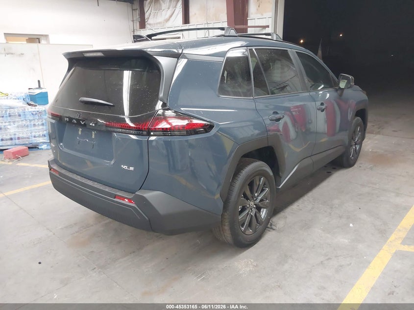 2026 Toyota Rav 4 VIN 2T36DRBV2TC001048 IAAI salvage auction — SIDE, Salvage Title, sold $17,100 on 2026-07-31 (photo 4)