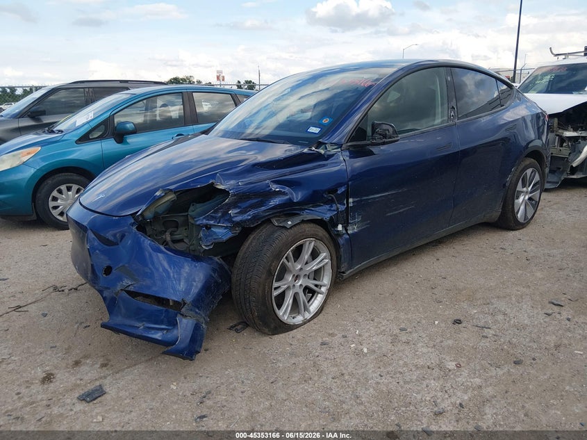 2023 Tesla Model y VIN 7SAYGDEE2PA054115 IAAI salvage auction — SIDE, Wait Title, sold $8,100 on 2026-08-02 (photo 2)