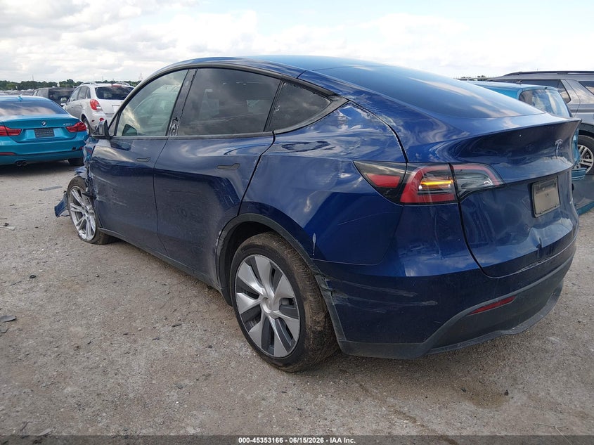 2023 Tesla Model y VIN 7SAYGDEE2PA054115 IAAI salvage auction — SIDE, Wait Title, sold $8,100 on 2026-08-02 (photo 3)