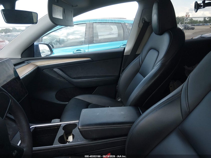 2023 Tesla Model y VIN 7SAYGDEE2PA054115 IAAI salvage auction — SIDE, Wait Title, sold $8,100 on 2026-08-02 (photo 7)
