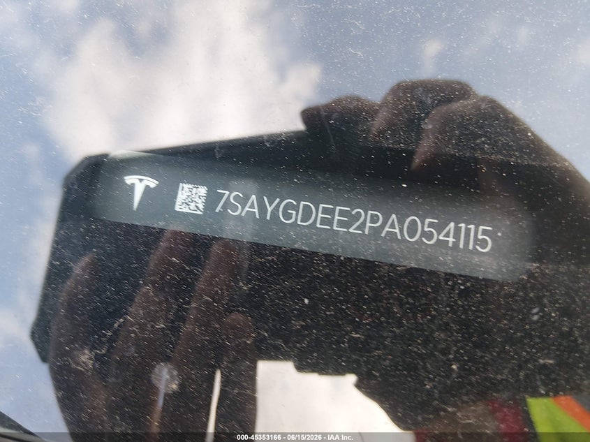 2023 Tesla Model y VIN 7SAYGDEE2PA054115 IAAI salvage auction — SIDE, Wait Title, sold $8,100 on 2026-08-02 (photo 9)