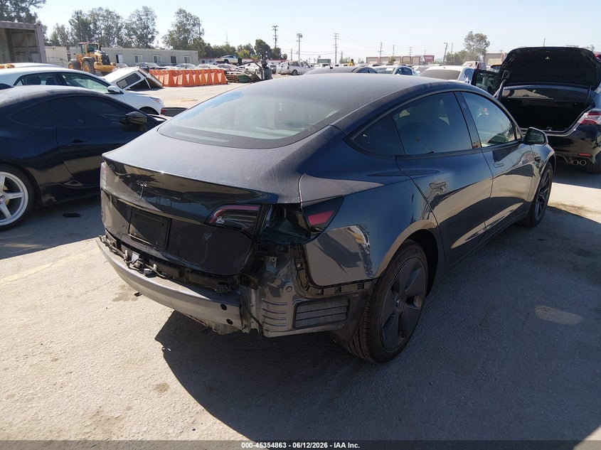 2023 Tesla Model 3 VIN 5YJ3E1EA6PF629148 IAAI salvage auction — REAR END, Salvage (California), sold $9,000 on 2026-07-08 (photo 4)