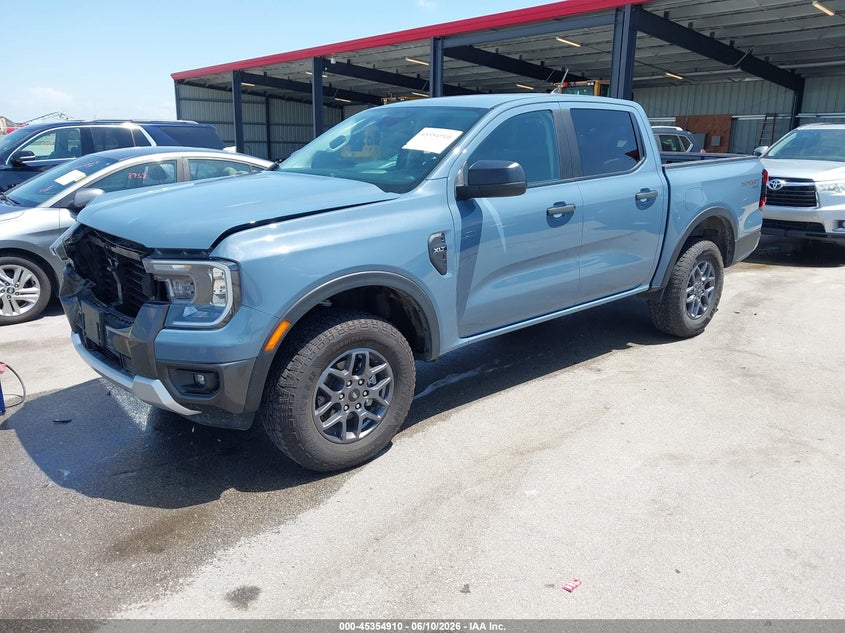 2025 Ford Ranger VIN 1FTER4HH6SLE51741 IAAI salvage auction — SIDE, Salvage Title, sold $11,800 on 2026-08-01 (photo 2)