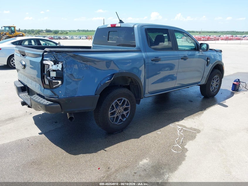 2025 Ford Ranger VIN 1FTER4HH6SLE51741 IAAI salvage auction — SIDE, Salvage Title, sold $11,800 on 2026-08-01 (photo 4)