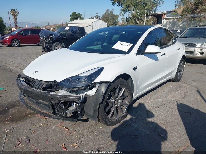 2023 Tesla Model 3 VIN 5YJ3E1EA4PF706504 IAAI salvage auction — FRONT END, Salvage (California), sold $8,700 on 2026-07-10 (photo 2)