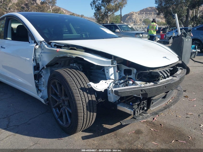2023 Tesla Model 3 VIN 5YJ3E1EA4PF706504 IAAI salvage auction — FRONT END, Salvage (California), sold $8,700 on 2026-07-10 (photo 6)