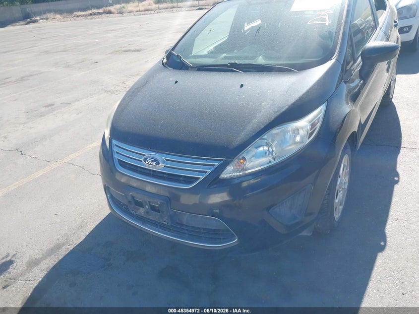 2011 Ford Fiesta VIN 3FADP4BJ5BM160102 IAAI salvage auction — NORMAL WEAR, Clear (Utah), sold $400 on 2026-07-09 (photo 6)