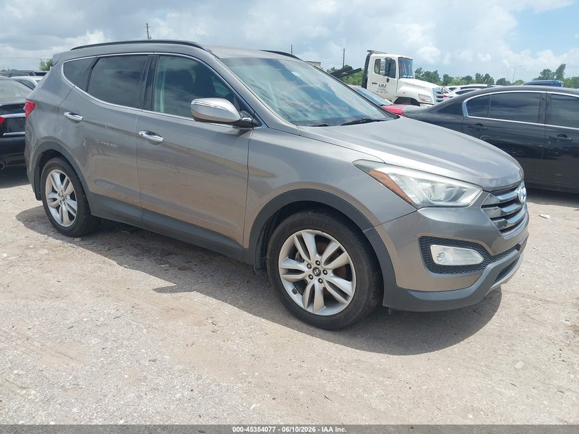 2014 Hyundai Santa fe VIN 5XYZUDLA4EG204244 IAAI salvage auction — NORMAL WEAR, Original (Texas), sold $825 on 2026-07-08 (photo 1)