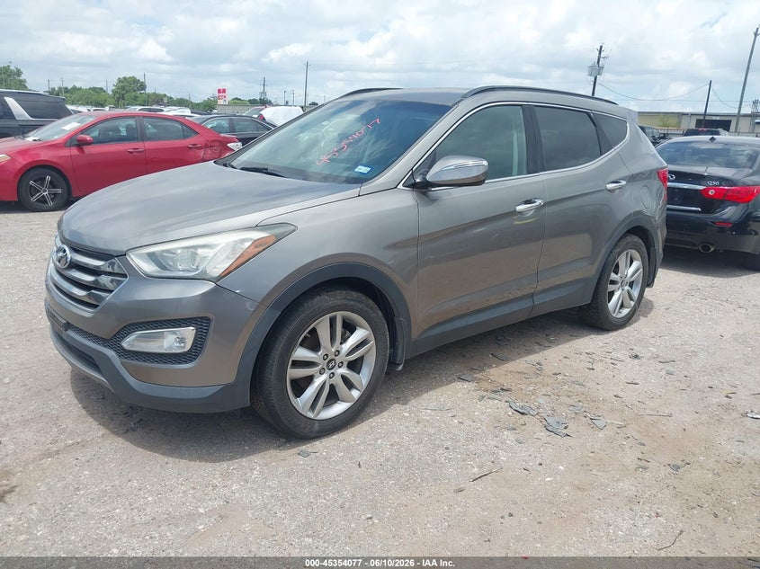 2014 Hyundai Santa fe VIN 5XYZUDLA4EG204244 IAAI salvage auction — NORMAL WEAR, Original (Texas), sold $825 on 2026-07-08 (photo 2)