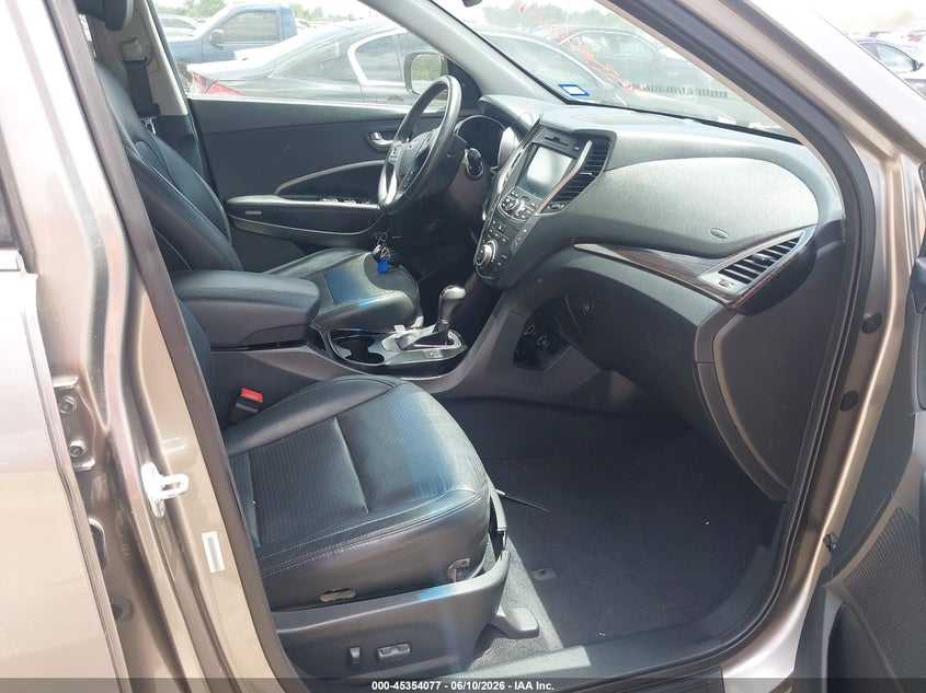 2014 Hyundai Santa fe VIN 5XYZUDLA4EG204244 IAAI salvage auction — NORMAL WEAR, Original (Texas), sold $825 on 2026-07-08 (photo 5)
