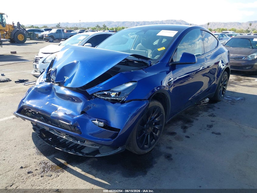 2023 Tesla Model y VIN 7SAYGDEE8PA185176 IAAI salvage auction — FRONT END, Salvage (Arizona), sold $8,800 on 2026-07-11 (photo 2)