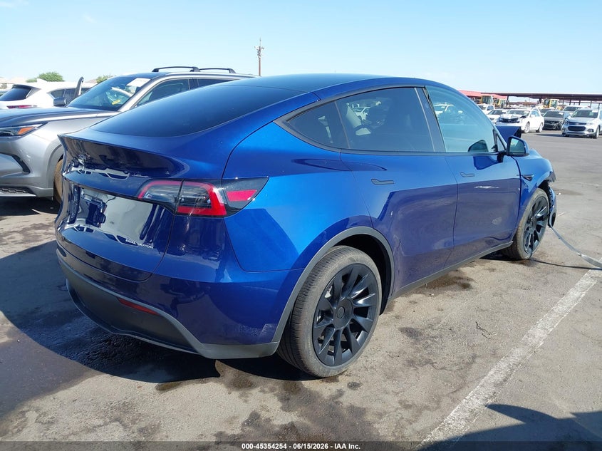 2023 Tesla Model y VIN 7SAYGDEE8PA185176 IAAI salvage auction — FRONT END, Salvage (Arizona), sold $8,800 on 2026-07-11 (photo 4)