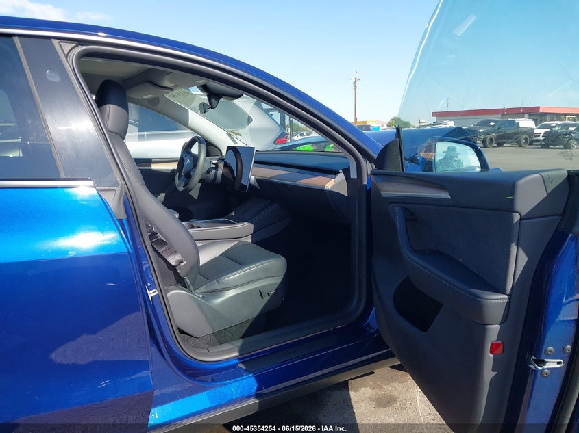 2023 Tesla Model y VIN 7SAYGDEE8PA185176 IAAI salvage auction — FRONT END, Salvage (Arizona), sold $8,800 on 2026-07-11 (photo 5)