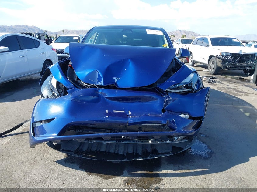 2023 Tesla Model y VIN 7SAYGDEE8PA185176 IAAI salvage auction — FRONT END, Salvage (Arizona), sold $8,800 on 2026-07-11 (photo 6)
