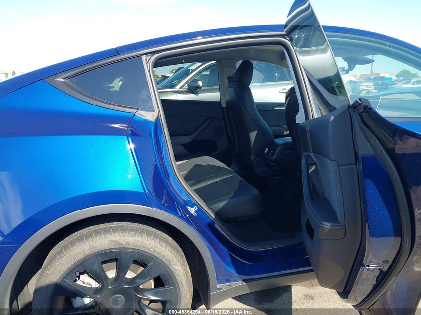 2023 Tesla Model y VIN 7SAYGDEE8PA185176 IAAI salvage auction — FRONT END, Salvage (Arizona), sold $8,800 on 2026-07-11 (photo 8)