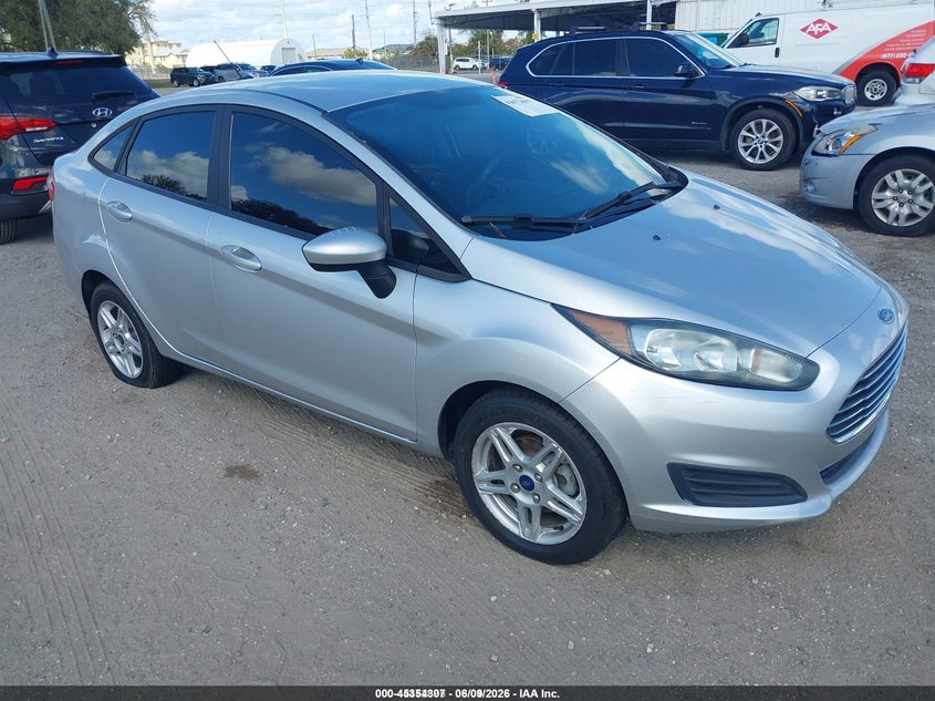 2019 Ford Fiesta VIN 3FADP4BJ7KM151319 IAAI salvage auction — SIDE, Rebuildable (Florida), sold $450 on 2026-07-19 (photo 1)