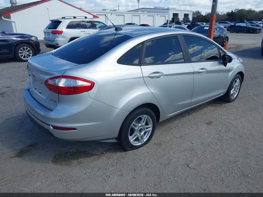 2019 Ford Fiesta VIN 3FADP4BJ7KM151319 IAAI salvage auction — SIDE, Rebuildable (Florida), sold $450 on 2026-07-19 (photo 4)
