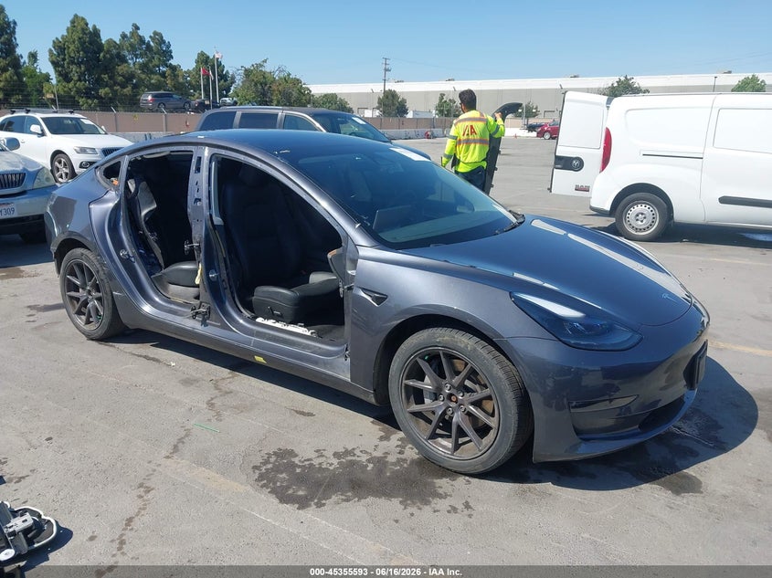 2023 Tesla Model 3 VIN 5YJ3E1EB2PF689064 IAAI salvage auction — SIDE, Salvage (California), sold $7,800 on 2026-07-12 (photo 1)