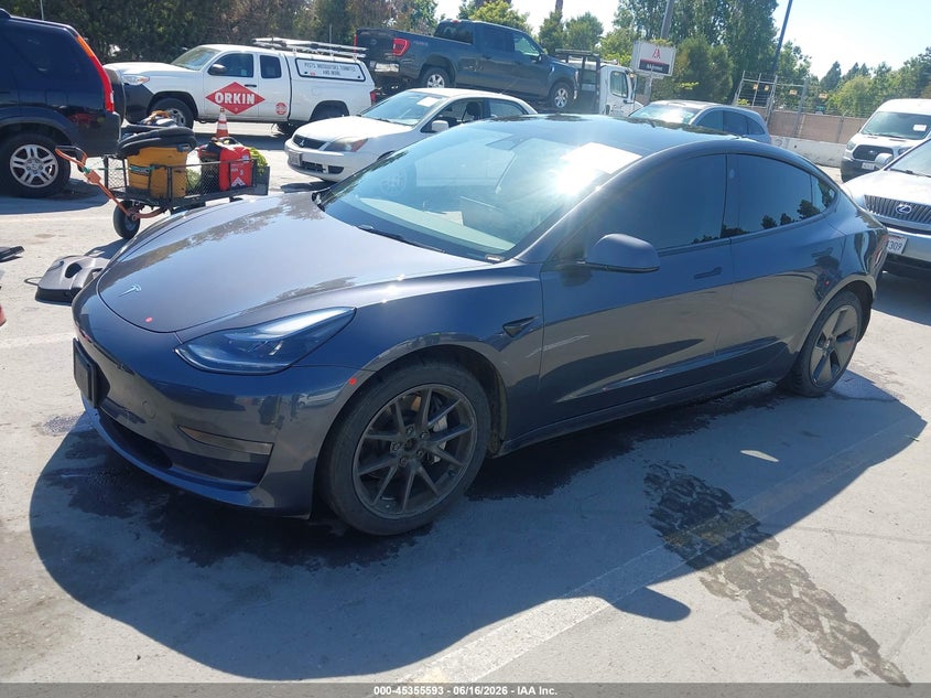 2023 Tesla Model 3 VIN 5YJ3E1EB2PF689064 IAAI salvage auction — SIDE, Salvage (California), sold $7,800 on 2026-07-12 (photo 2)
