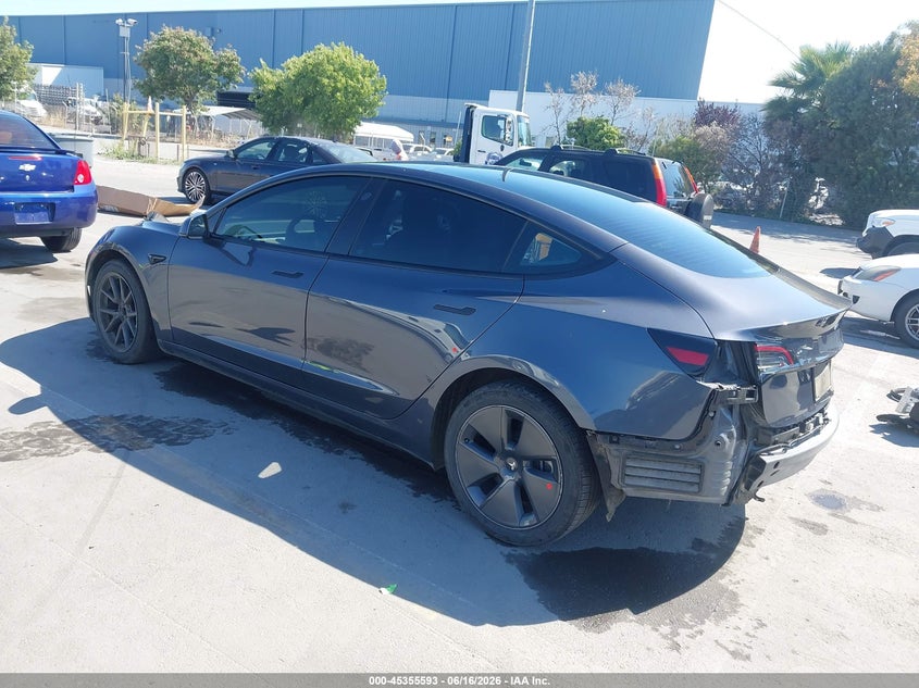 2023 Tesla Model 3 VIN 5YJ3E1EB2PF689064 IAAI salvage auction — SIDE, Salvage (California), sold $7,800 on 2026-07-12 (photo 3)