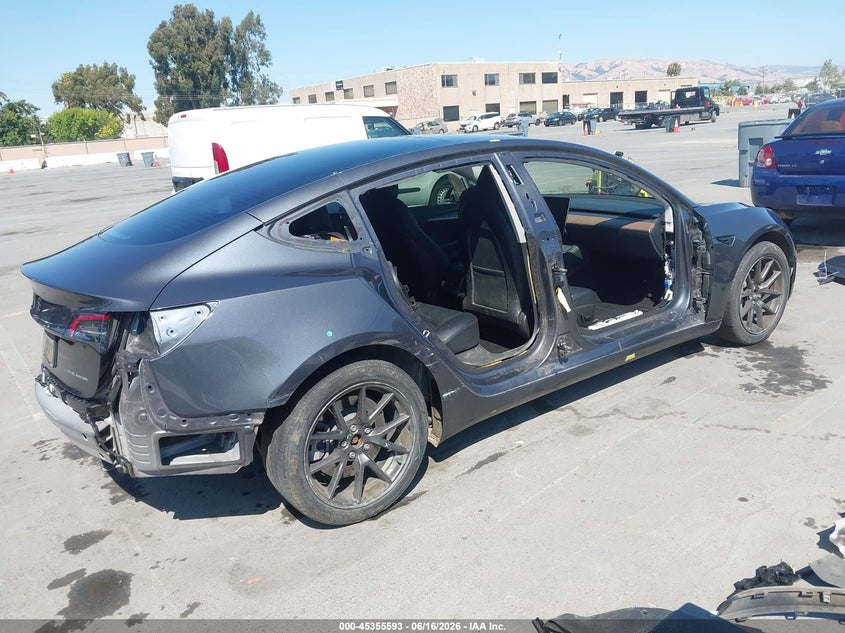 2023 Tesla Model 3 VIN 5YJ3E1EB2PF689064 IAAI salvage auction — SIDE, Salvage (California), sold $7,800 on 2026-07-12 (photo 4)