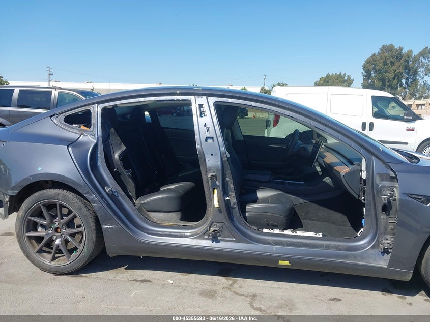 2023 Tesla Model 3 VIN 5YJ3E1EB2PF689064 IAAI salvage auction — SIDE, Salvage (California), sold $7,800 on 2026-07-12 (photo 6)