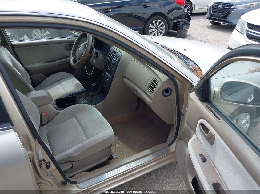 2004 Kia Optima VIN KNAGD126645294519 IAAI salvage auction — NORMAL WEAR, Original (Texas), sold $275 on 2026-07-21 (photo 5)