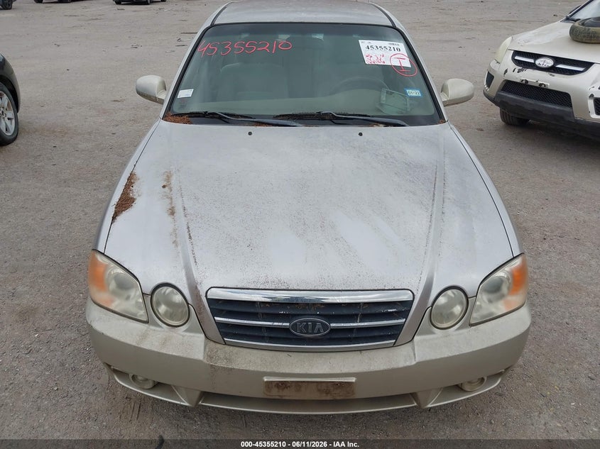 2004 Kia Optima VIN KNAGD126645294519 IAAI salvage auction — NORMAL WEAR, Original (Texas), sold $275 on 2026-07-21 (photo 6)