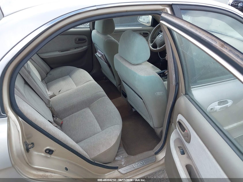 2004 Kia Optima VIN KNAGD126645294519 IAAI salvage auction — NORMAL WEAR, Original (Texas), sold $275 on 2026-07-21 (photo 8)