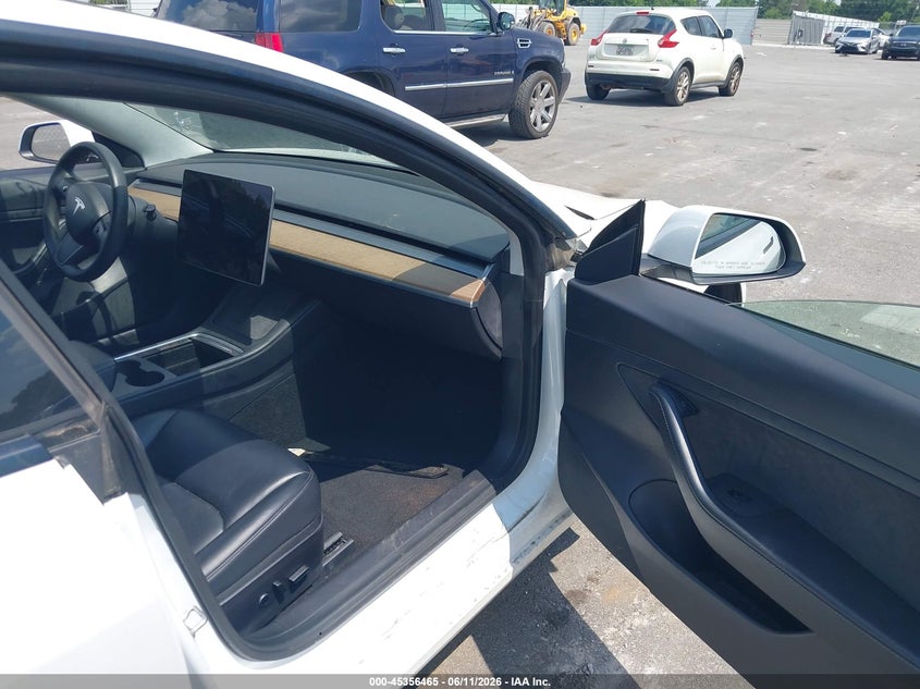 2021 Tesla Model 3 VIN 5YJ3E1EA1MF854217 IAAI salvage auction — REPOSSESSION, Salvage Title, sold $13,600 on 2026-07-15 (photo 5)