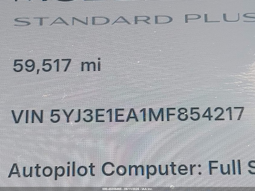 2021 Tesla Model 3 VIN 5YJ3E1EA1MF854217 IAAI salvage auction — REPOSSESSION, Salvage Title, sold $13,600 on 2026-07-15 (photo 9)