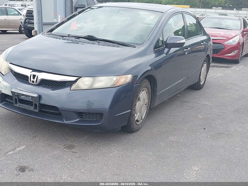 2010 Honda Civic hybrid VIN JHMFA3F23AS005599 IAAI salvage auction — NORMAL WEAR, Repossession Paperwork (Georgia), sold $375 on 2026-07-29 (photo 2)