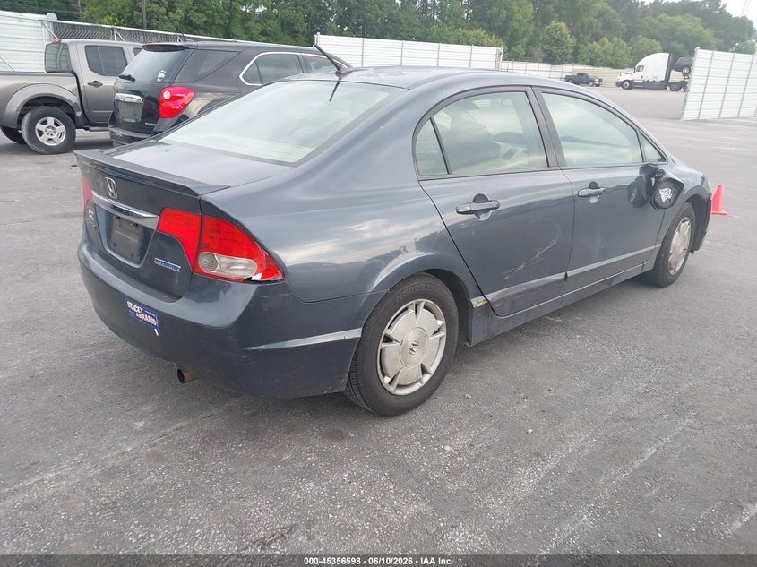 2010 Honda Civic hybrid VIN JHMFA3F23AS005599 IAAI salvage auction — NORMAL WEAR, Repossession Paperwork (Georgia), sold $375 on 2026-07-29 (photo 4)