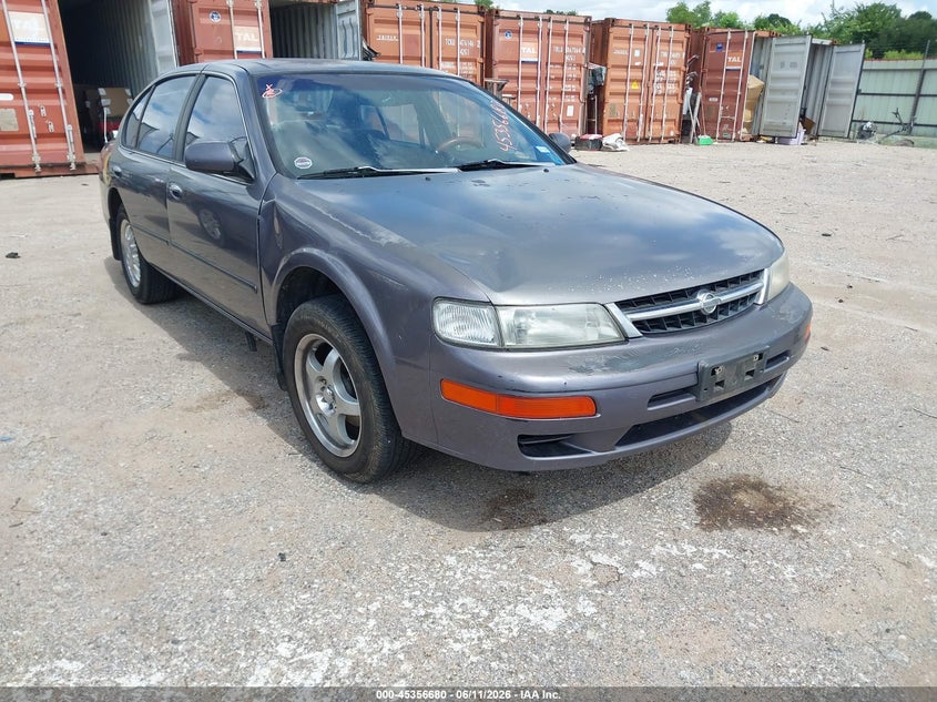 1997 Nissan Maxima VIN JN1CA21D5VT857530 IAAI salvage auction — NORMAL WEAR, Original (Texas), sold $100 on 2026-07-22 (photo 1)