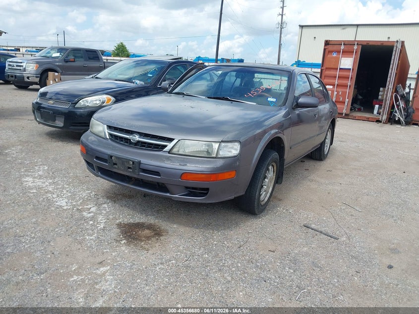 1997 Nissan Maxima VIN JN1CA21D5VT857530 IAAI salvage auction — NORMAL WEAR, Original (Texas), sold $100 on 2026-07-22 (photo 2)