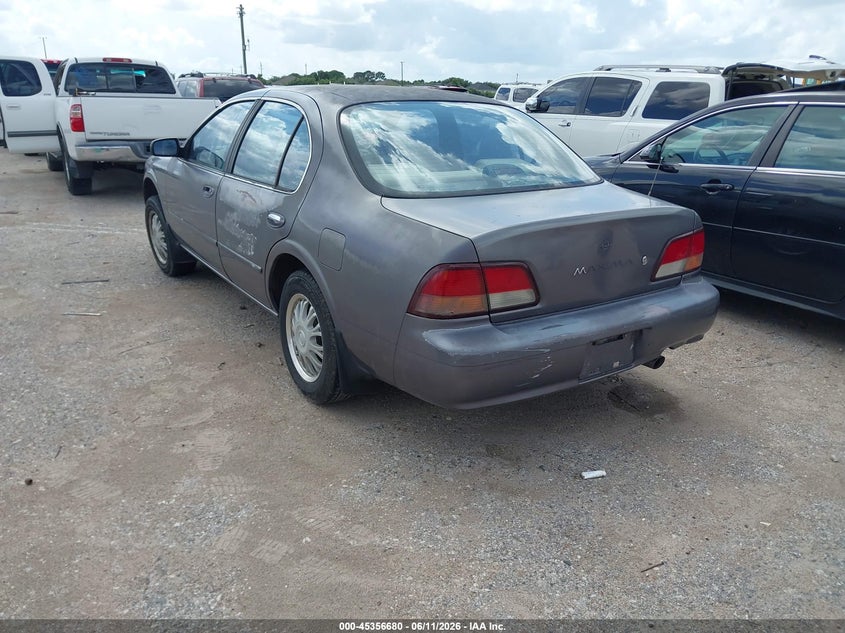 1997 Nissan Maxima VIN JN1CA21D5VT857530 IAAI salvage auction — NORMAL WEAR, Original (Texas), sold $100 on 2026-07-22 (photo 3)