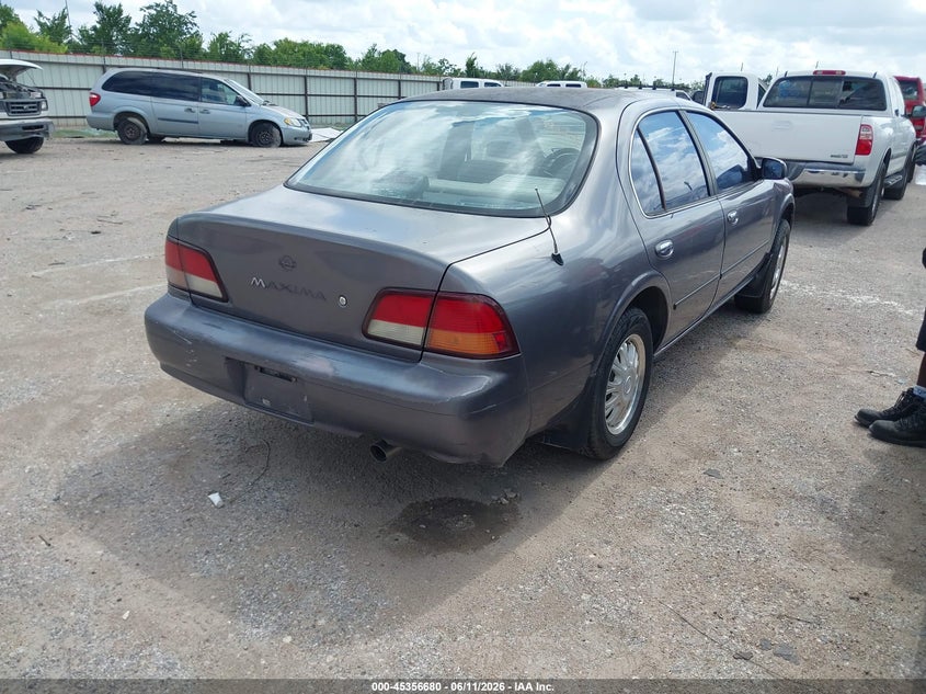 1997 Nissan Maxima VIN JN1CA21D5VT857530 IAAI salvage auction — NORMAL WEAR, Original (Texas), sold $100 on 2026-07-22 (photo 4)