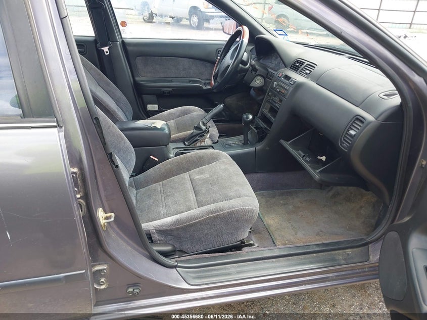 1997 Nissan Maxima VIN JN1CA21D5VT857530 IAAI salvage auction — NORMAL WEAR, Original (Texas), sold $100 on 2026-07-22 (photo 5)