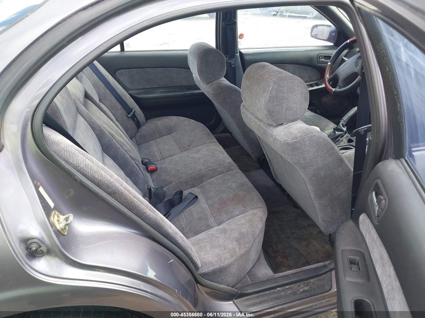 1997 Nissan Maxima VIN JN1CA21D5VT857530 IAAI salvage auction — NORMAL WEAR, Original (Texas), sold $100 on 2026-07-22 (photo 8)