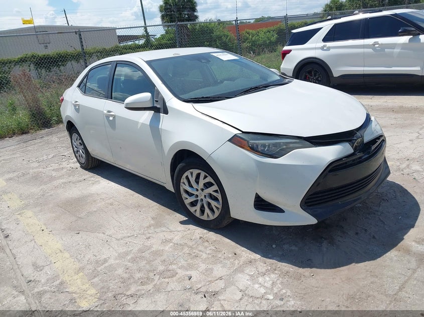 2018 Toyota Corolla VIN 5YFBURHE1JP742397 IAAI salvage auction — REAR END, Rebuildable (Florida), sold $2,800 on 2026-07-10 (photo 1)