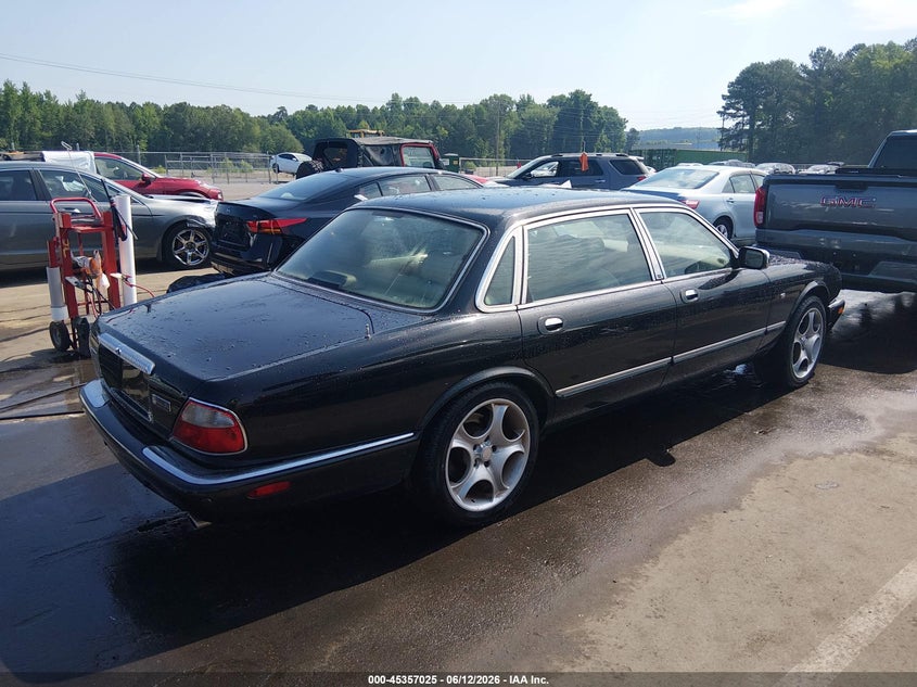 2002 Jaguar Xj series VIN SAJDA24C02LF41652 IAAI salvage auction — LEFT SIDE, Salvage (North Carolina), sold $1,450 on 2026-07-29 (photo 4)