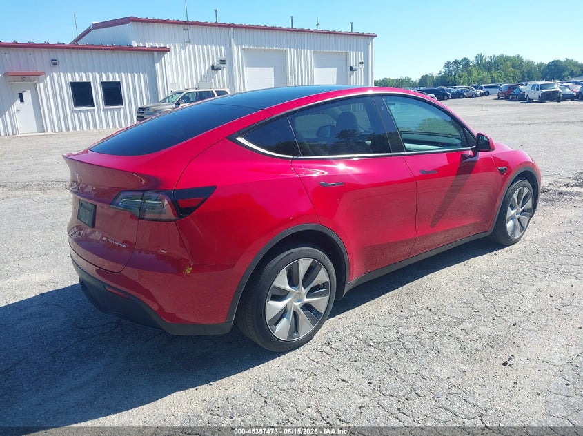 2023 Tesla Model y VIN 7SAYGDEE2PF617280 IAAI salvage auction — SIDE, Salvage (Virginia), sold $2,550 on 2026-07-24 (photo 4)