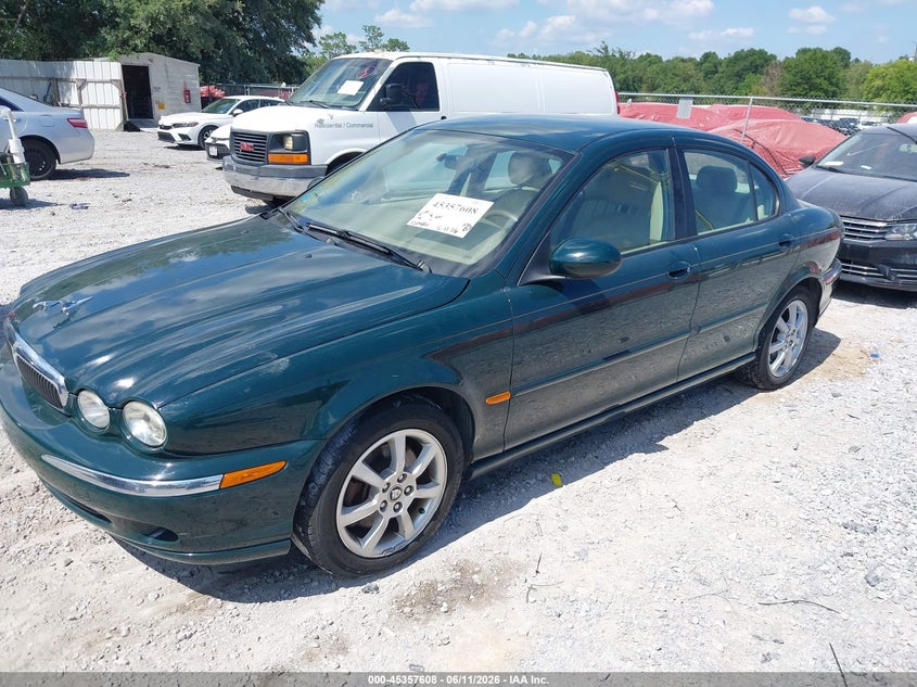 2004 Jaguar X type VIN SAJEB52D04XD67687 IAAI salvage auction — NORMAL WEAR, Clear (Florida), sold $425 on 2026-07-09 (photo 2)